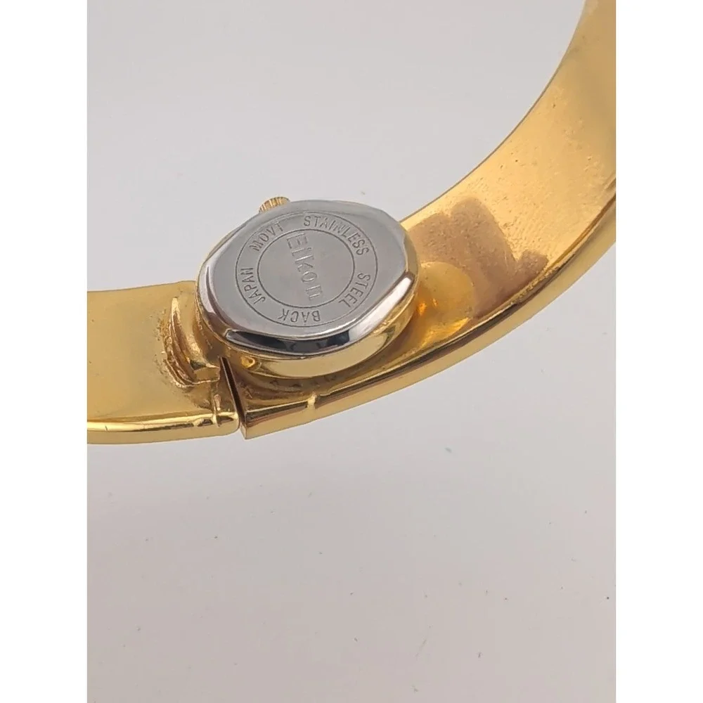 Eikon Women Watch 17mm Hidden Dial Gold Case Snakeskin Cuff 6.5